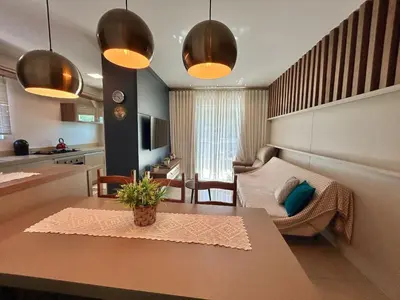 Uma área de estar em Apartamento no Residencial Toronto – Conforto e praticidade a poucos metros do mar!