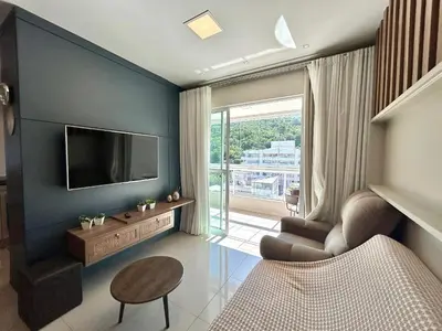 Uma televisão e/ou sistema de entretenimento em Apartamento no Residencial Toronto – Conforto e praticidade a poucos metros do mar!