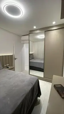 Uma cama ou camas num quarto em Apartamento Meia Praia - Itapema