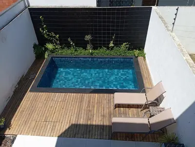 A piscina em ou perto de Casa com piscina em Camboriú