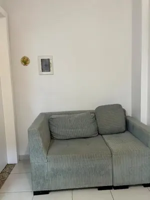 Uma área de estar em Clube do Mar-rua 224-Itapema Meia Praia Apt 201 A