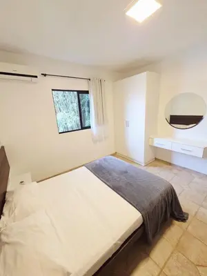 Uma cama ou camas num quarto em Cantinho da costeira