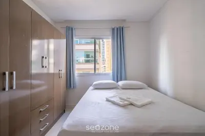 Uma cama ou camas num quarto em Apto 3Q c/ churrasq. 500m da praia Itapema ESM602