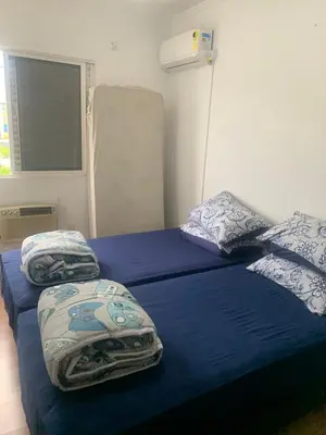 Uma cama ou camas num quarto em Apartamento Frente Mar Barra Sul