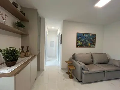 Uma área de estar em Apto 3 quartos garagem e churrasqueira