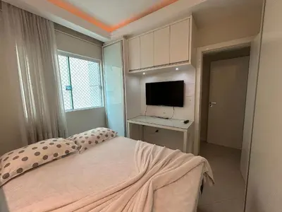 Uma televisão e/ou sistema de entretenimento em Apto Almeida e Moraes 3 Suítes c/churrasqueira Meia Praia
