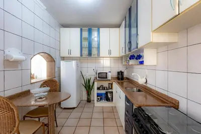 A cozinha ou kitchenette de Apartamento com Varanda, Churrasqueira e Vista Mar
