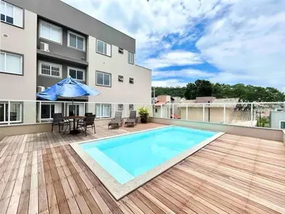 A piscina em ou perto de Apartamento 104 B com Piscina em Bombinhas