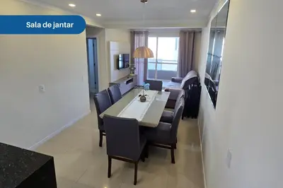 Uma televisão e/ou sistema de entretenimento em Apartamento no Coração de Bombinhas