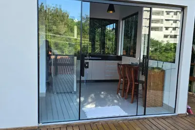 Uma varanda ou terraço em Loft Romântico no centro de Bombinhas