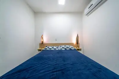 Uma cama ou camas num quarto em Apartment 07 Lagoinha Bombinhas