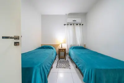 Uma cama ou camas num quarto em Apartment 07 Lagoinha Bombinhas