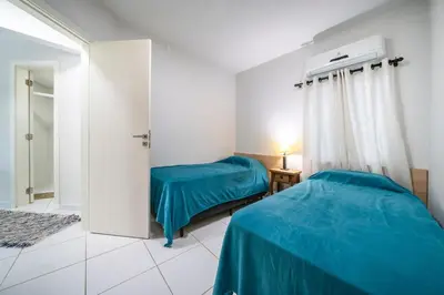 Uma cama ou camas num quarto em Apartment 07 Lagoinha Bombinhas