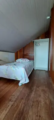 Uma cama ou camas num quarto em Kitinet 06 aconchego, 350 meters from 4 Ilhas