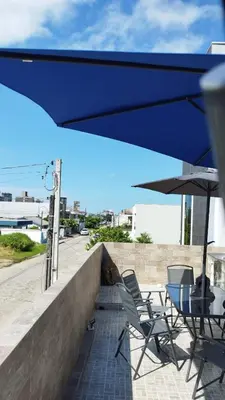 Uma varanda ou terraço em Apto Perequê Sacada Frente