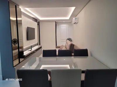 Uma televisão e/ou sistema de entretenimento em 2 suites, completo, luxo, piscina aquecida condominio, 1 quadra mar, ideal para descansar