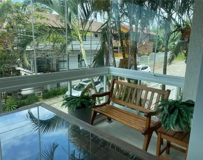 Uma varanda ou terraço em Apartamento Cancún perto da praia de Bombinhas centro