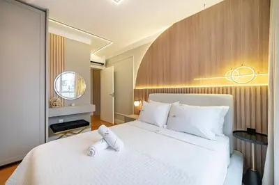 Uma cama ou camas num quarto em Achei Itapema • Vernon Classic Residencial, R.244