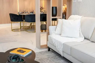 Uma área de estar em Achei Itapema • Vernon Classic Residencial, R.244
