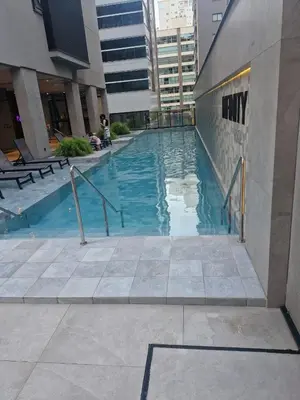 A piscina em ou perto de Apto em Itapema com acesso a piscinas,sendo uma aquecida e academia
