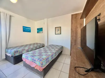 Uma televisão e/ou sistema de entretenimento em Vista do Mar 1 Quarto- Centro de Bombinhas