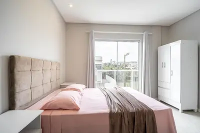 Uma cama ou camas num quarto em Casa 01 | 2 suítes | até 7 pessoas