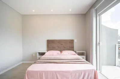 Uma cama ou camas num quarto em Casa 01 | 2 suítes | até 7 pessoas