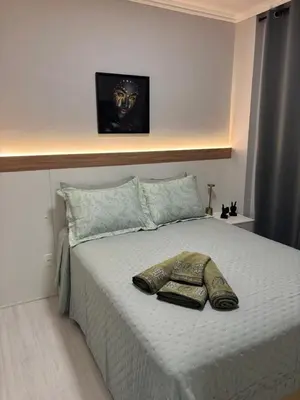 Uma cama ou camas num quarto em Aconchegante - Porto Iguaçu