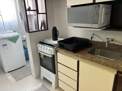 A cozinha ou kitchenette de Aconchegante - Porto Iguaçu