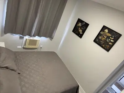 Uma cama ou camas num quarto em Aconchegante - Porto Iguaçu