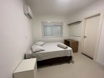 Uma cama ou camas num quarto em 2 suítes Canto Grande