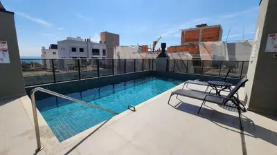 A piscina em ou perto de Flat com Piscina