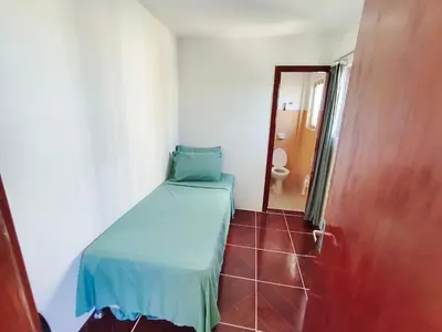 Uma cama ou camas num quarto em Cobertura duplex c/ terraço e churrasqueira em BC