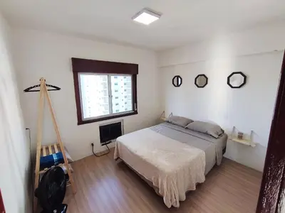 Uma cama ou camas num quarto em Cobertura duplex c/ terraço e churrasqueira em BC