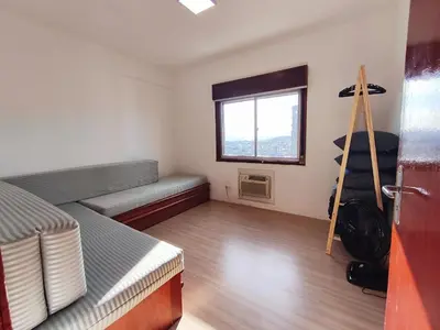 Uma cama ou camas num quarto em Cobertura duplex c/ terraço e churrasqueira em BC