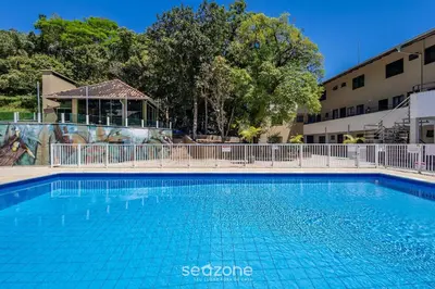 A piscina em ou perto de Apto em Cond. c/ Piscina a 140 m da Praia RAR0213
