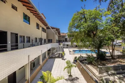 A piscina em ou perto de Apto em Cond. c/ Piscina a 140 m da Praia RAR0213