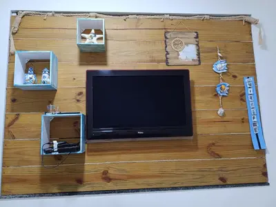 Uma televisão e/ou sistema de entretenimento em Recanto Aurora de Bombinhas