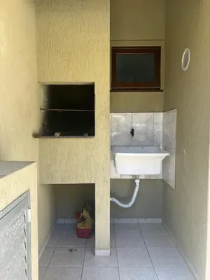 Uma televisão e/ou sistema de entretenimento em Apartmento Quatro Ilhas - Bombinhas with ocean view!