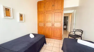 Uma cama ou camas num quarto em ASA | Frente Mar | Pé na Areia | 4QT | BC