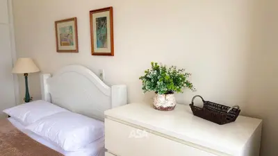 Uma cama ou camas num quarto em ASA | Frente Mar | Pé na Areia | 4QT | BC