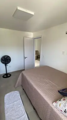 Uma cama ou camas num quarto em Ap sol nascente