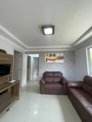 Uma área de estar em Casa para 9 pessoas - Bombinhas Centro