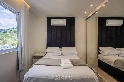 Uma cama ou camas num quarto em Apto c/ Churrasqueira a 850 m da Praia SEM0302