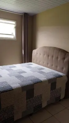Uma cama ou camas num quarto em Casa centro