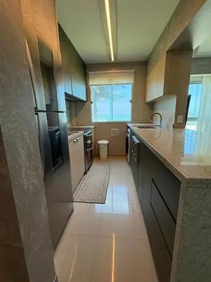 A cozinha ou kitchenette de Frente ao Mar - Ilhota - Itapema