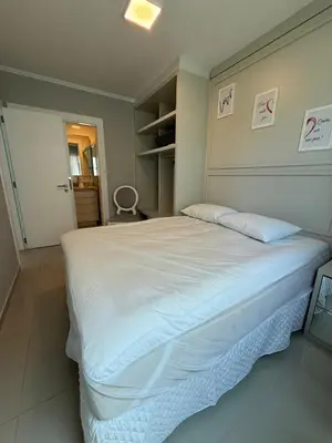 Uma cama ou camas num quarto em Frente ao Mar - Ilhota - Itapema