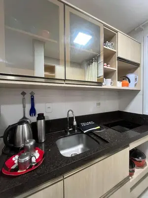 A cozinha ou kitchenette de Apartamento simples em Porto Belo, 800 metros da praia