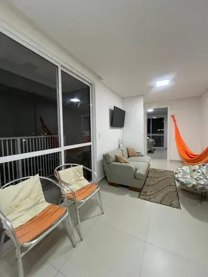 Uma área de estar em Apartamento simples em Porto Belo, 800 metros da praia