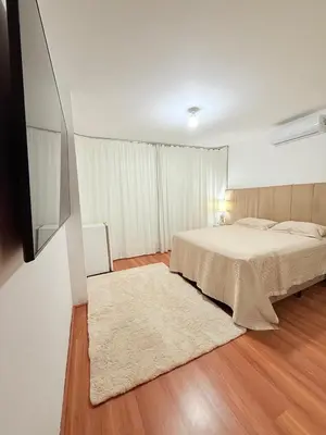 Uma cama ou camas num quarto em Tripex 250m do Mar com piscina, jacuzzi e muito mais